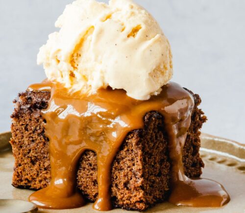 vegan sticky date cake with toffee and vanilla ice cream