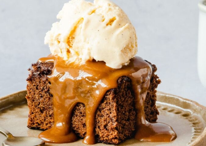 vegan sticky date cake with toffee and vanilla ice cream