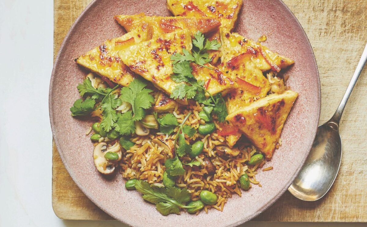 Vegan sticky marmalade tofu cut into thin triangles