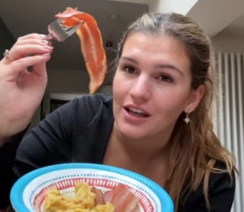 Nicole Whittle holds up vegan bacon during her one-day experiment trying the carnivore diet using only plant-based meat alternatives.