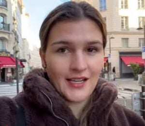 Nicole Whittle in a still from her vegan Paris vlog YouTube video