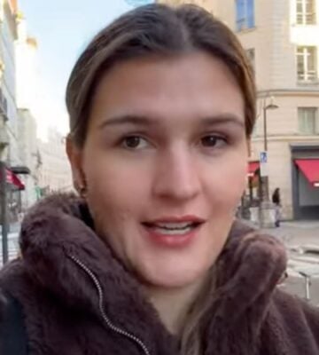 Nicole Whittle in a still from her vegan Paris vlog YouTube video
