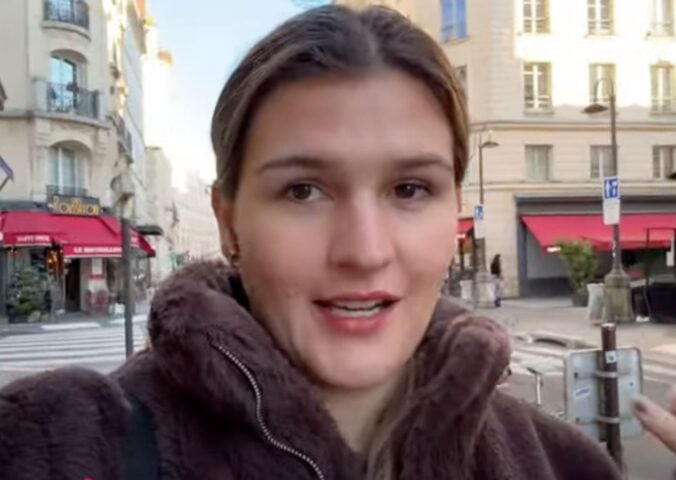 Nicole Whittle in a still from her vegan Paris vlog YouTube video