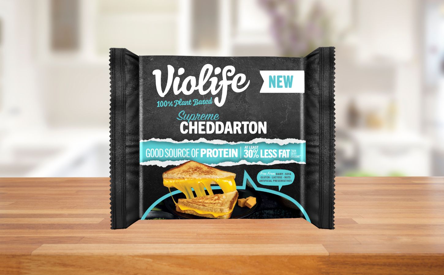 A packet of Violife high-protein vegan cheese on a kitchen shelf