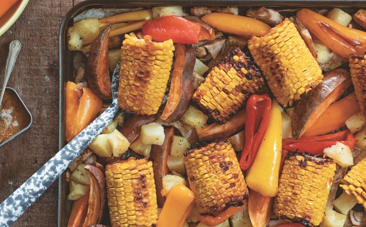 warming jerk jackfruit with corn, peppers, and pineapple