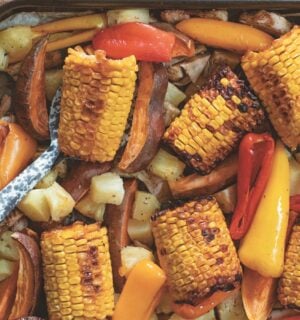 warming jerk jackfruit with corn, peppers, and pineapple