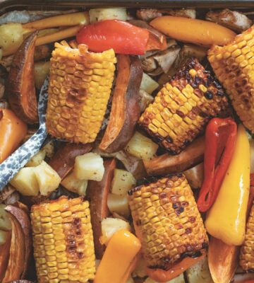 warming jerk jackfruit with corn, peppers, and pineapple