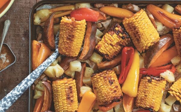 warming jerk jackfruit with corn, peppers, and pineapple
