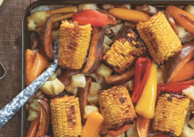 warming jerk jackfruit with corn, peppers, and pineapple