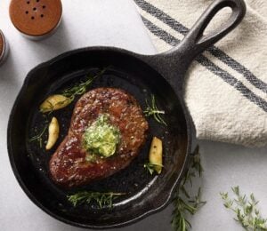 Photo shows the Beyond Steak Filet in a cast iron pan