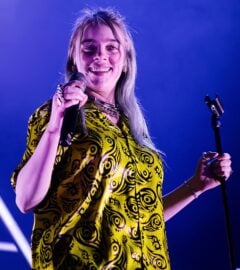 Photo shows Billie Eilish mid-performance in Spain