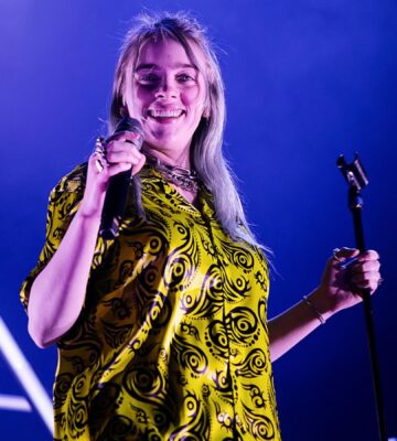 Photo shows Billie Eilish mid-performance in Spain