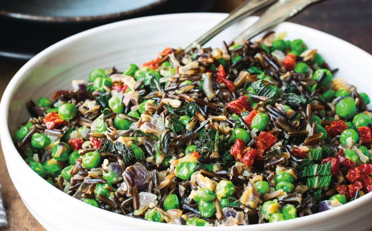 black rice peas with onion, sun-dried tomatoes, and mint leaves