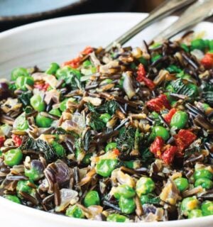 black rice peas with onion, sun-dried tomatoes, and mint leaves