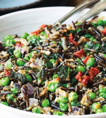 black rice peas with onion, sun-dried tomatoes, and mint leaves