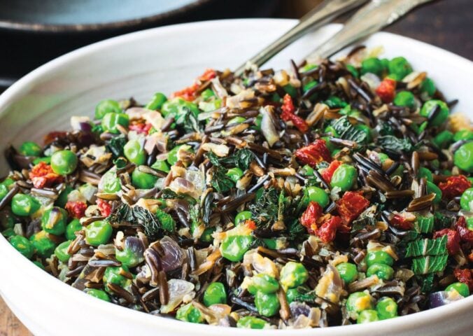black rice peas with onion, sun-dried tomatoes, and mint leaves