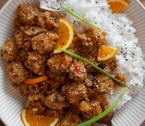 a plate of crispy orange sesame brussels sprouts for vegan recipes better than takeout