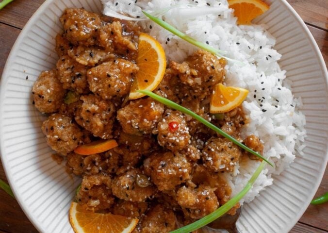 a plate of crispy orange sesame brussels sprouts for vegan recipes better than takeout