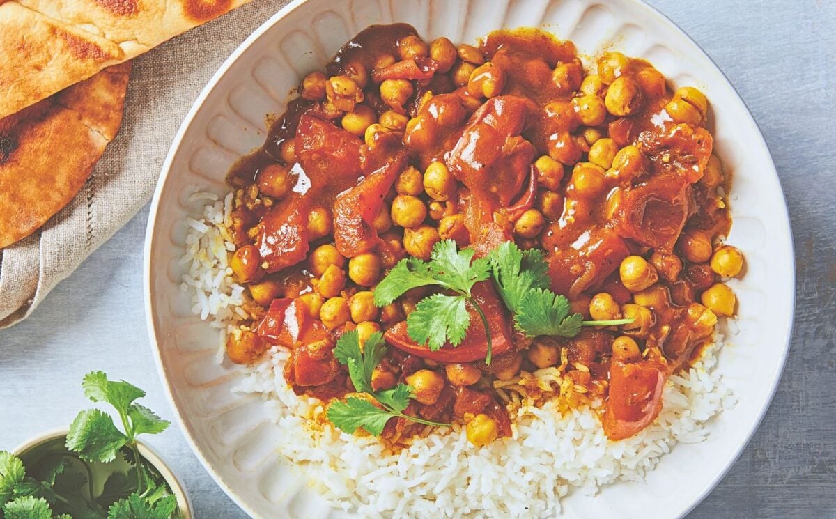a bowl of chickpea stew or chana masala for vegan dinners where chickpeas are the star of the show