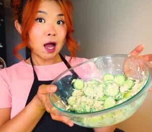 Rose at Cheap Lazy Vegan making cucumber salad from TikTok viral recipes
