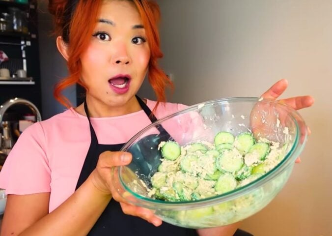 Rose at Cheap Lazy Vegan making cucumber salad from TikTok viral recipes