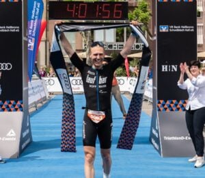 Vegan triathlete Max Hoffmann after winning a race