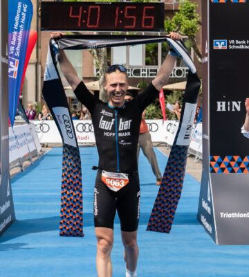 Vegan triathlete Max Hoffmann after winning a race