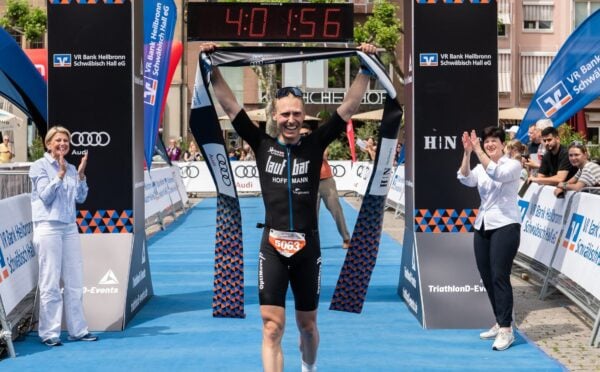 Vegan triathlete Max Hoffmann after winning a race