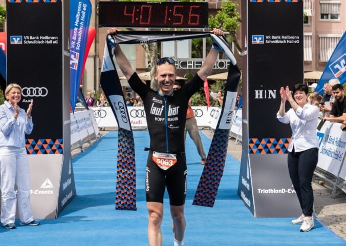 Vegan triathlete Max Hoffmann after winning a race