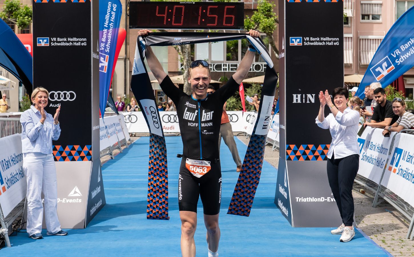 Vegan triathlete Max Hoffmann after winning a race