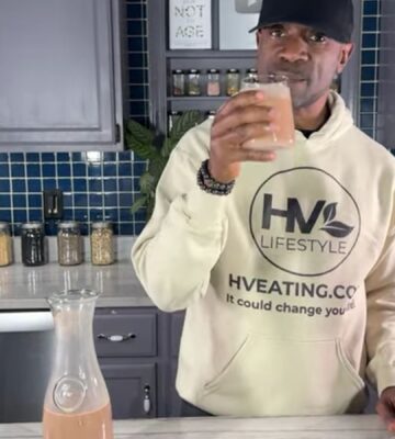 Javant at Healthy Vegan Eating drinking his creamy chocolate oat milk recipe