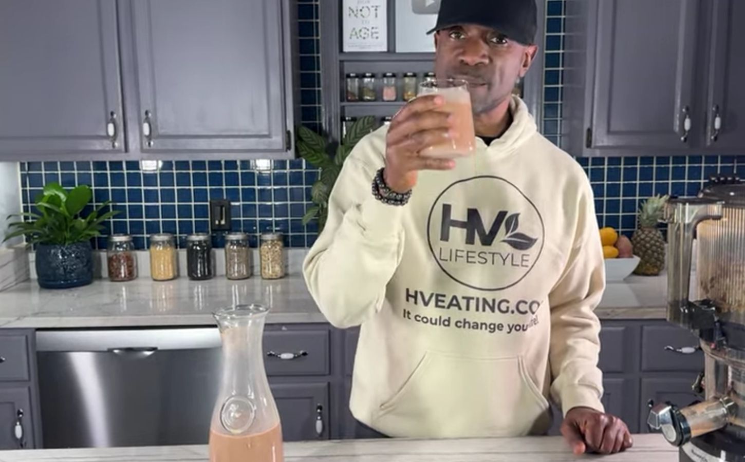 Javant at Healthy Vegan Eating drinking his creamy chocolate oat milk recipe