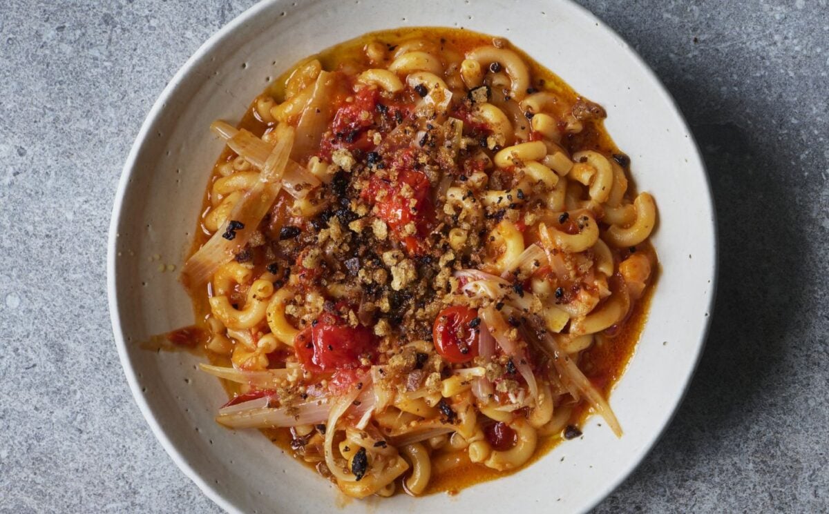a bowl of balsamic tomato macaroni with olive pangrattata for Mediterranean-inspired vegan recipes