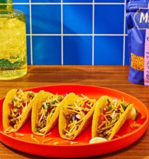 Photo shows the packaging for Oat Milk Taco Blend Seasoned Shreds, the newest vegan cheese from Miyoko's Creamery, as well as a selection of dishes featuring it, including tacos