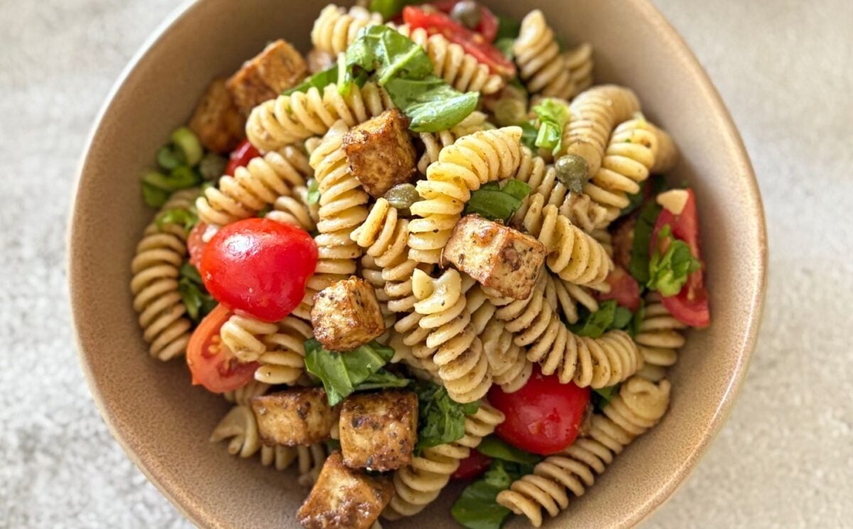 A bowl of olive paste pasta salad, a vegan pasta salad recipe