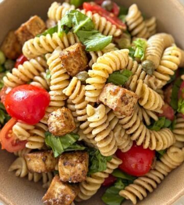 A bowl of olive paste pasta salad, a vegan pasta salad recipe