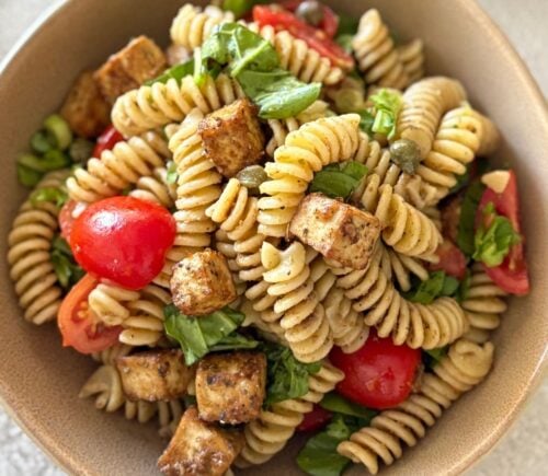 A bowl of olive paste pasta salad, a vegan pasta salad recipe