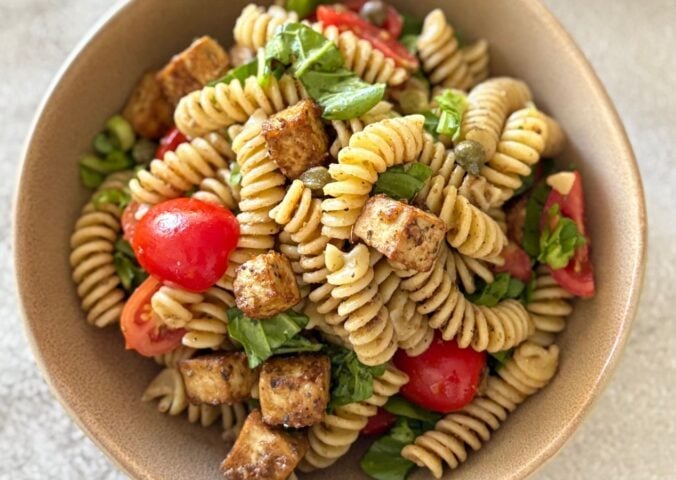 A bowl of olive paste pasta salad, a vegan pasta salad recipe