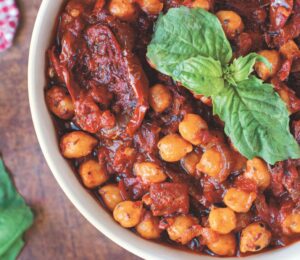 a bowl of one-pot sun-dried tomato and chickpea stew