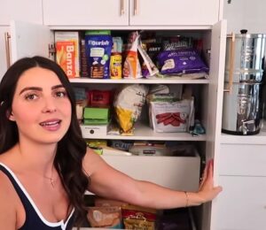 Stephanie from That Vegan Babe showing her various staples in her ultimate vegan pantry