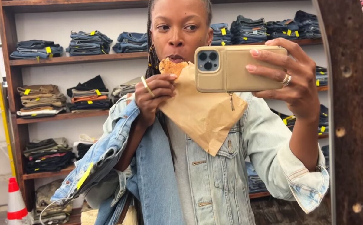 Sweet Potato Soul thrifting clothing on her trip, vegan tahini cookie included