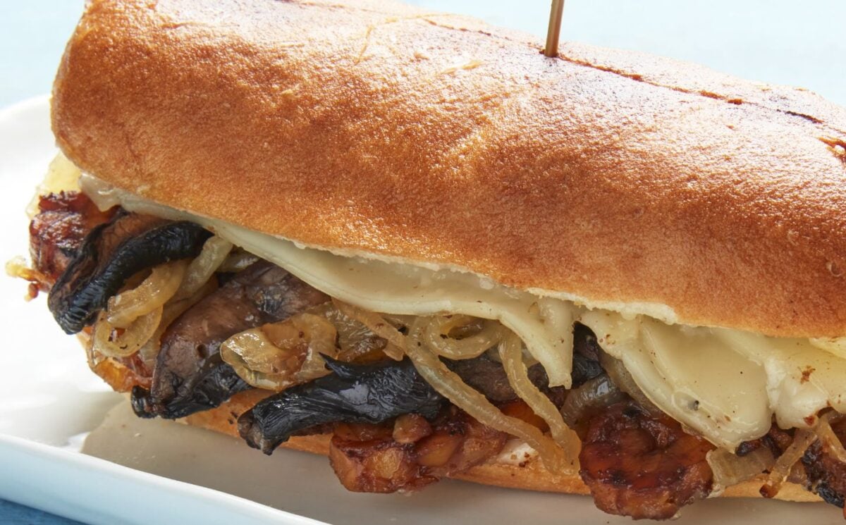 The Philly vegan cheesesteak made with high-protein tempeh, smoked mushrooms, and onions