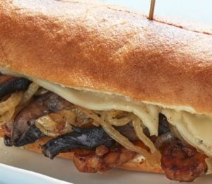 The Philly vegan cheesesteak made with high-protein tempeh, smoked mushrooms, and onions