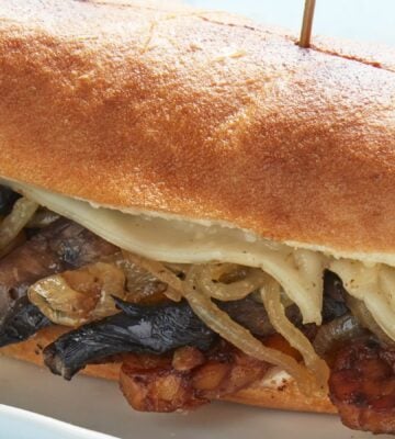 The Philly vegan cheesesteak made with high-protein tempeh, smoked mushrooms, and onions