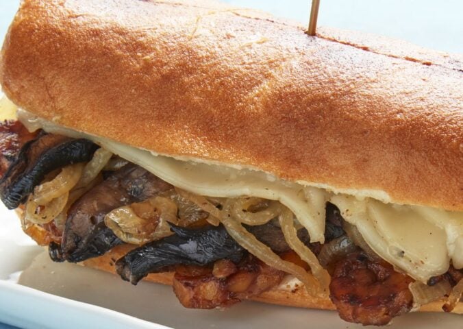 The Philly vegan cheesesteak made with high-protein tempeh, smoked mushrooms, and onions