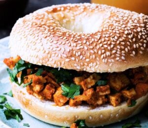 tofu taste cubes on a seeded bagel