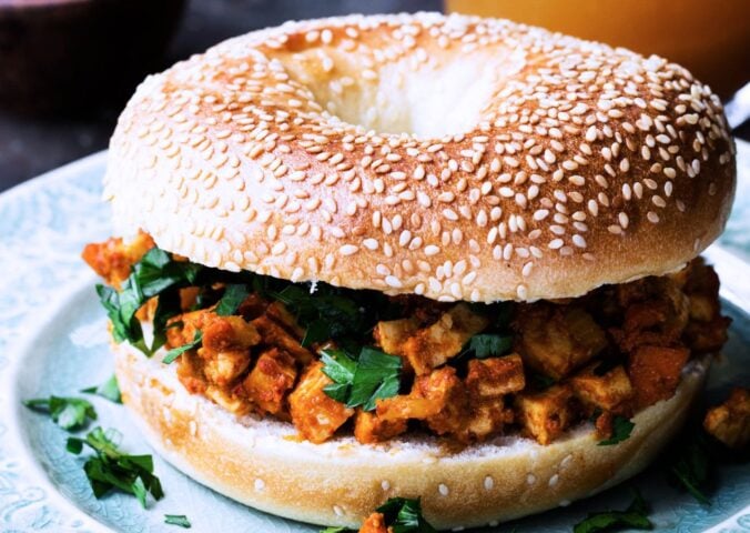 tofu taste cubes on a seeded bagel