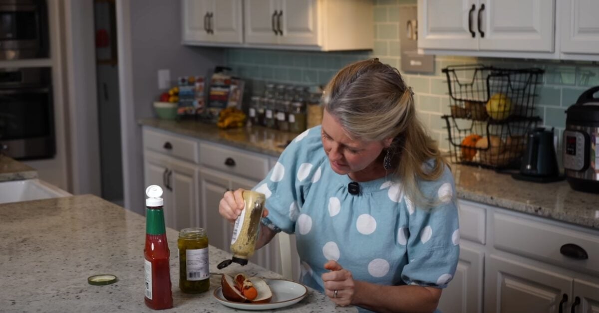 Plant-based recipe developer Jill Dalton making vegan carrot dogs in her kitchen