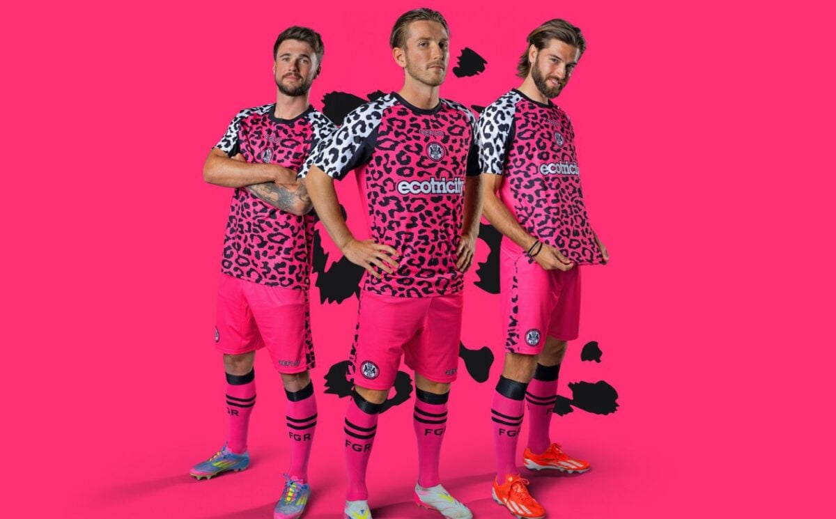 Photo shows three Forest Green Rovers players wearing the new neon pink away kits