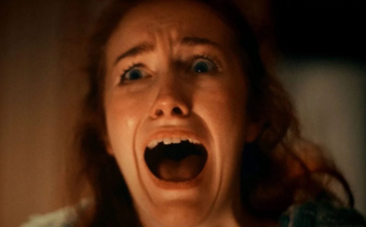 A screenshot from an anti-dairy advert by animal rights group Viva! showing a woman screaming